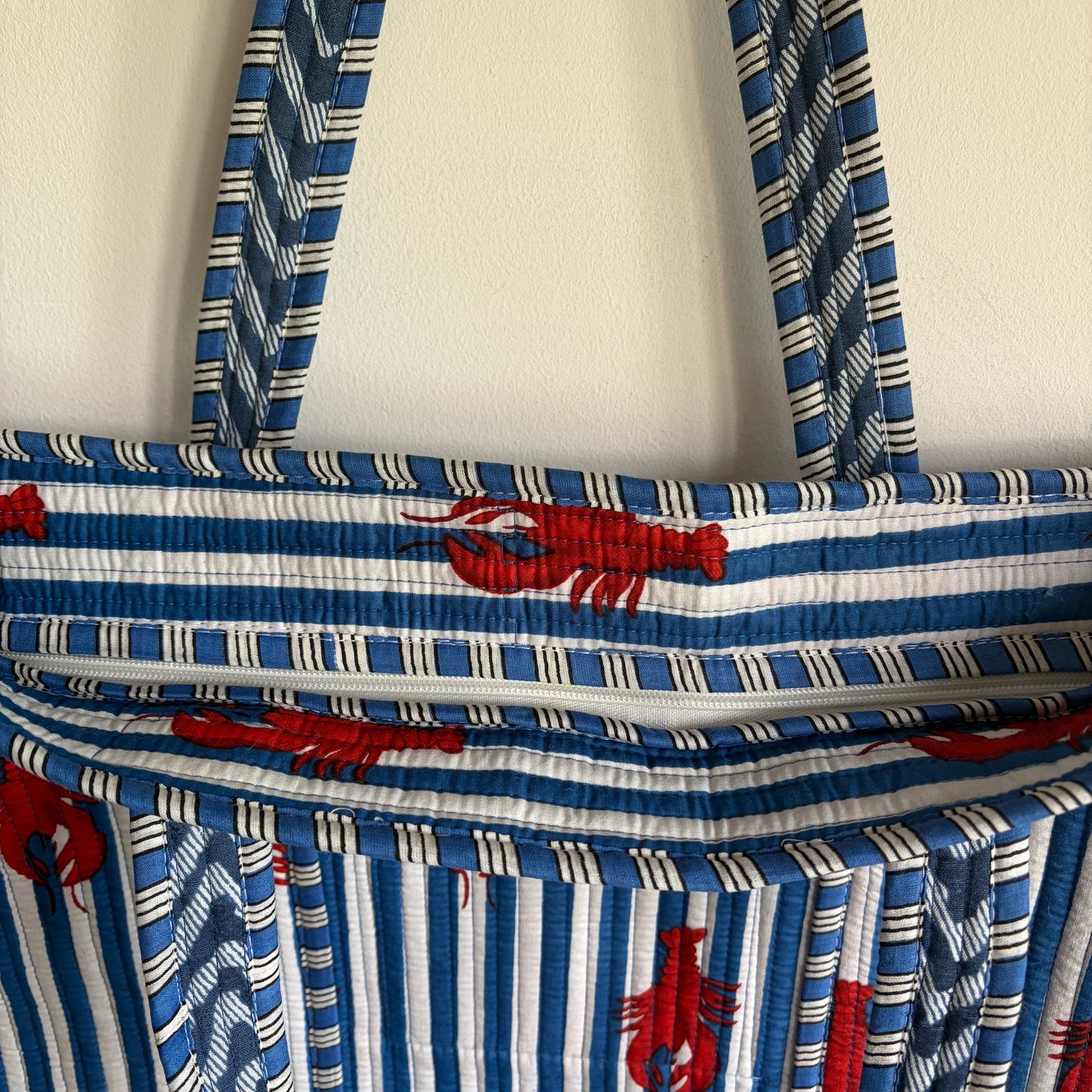 Blue and white striped bag with red lobster patterns Quilted Bag