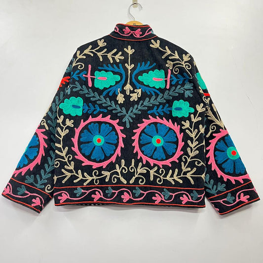 Embroidered jacket with colorful patterns on a white background