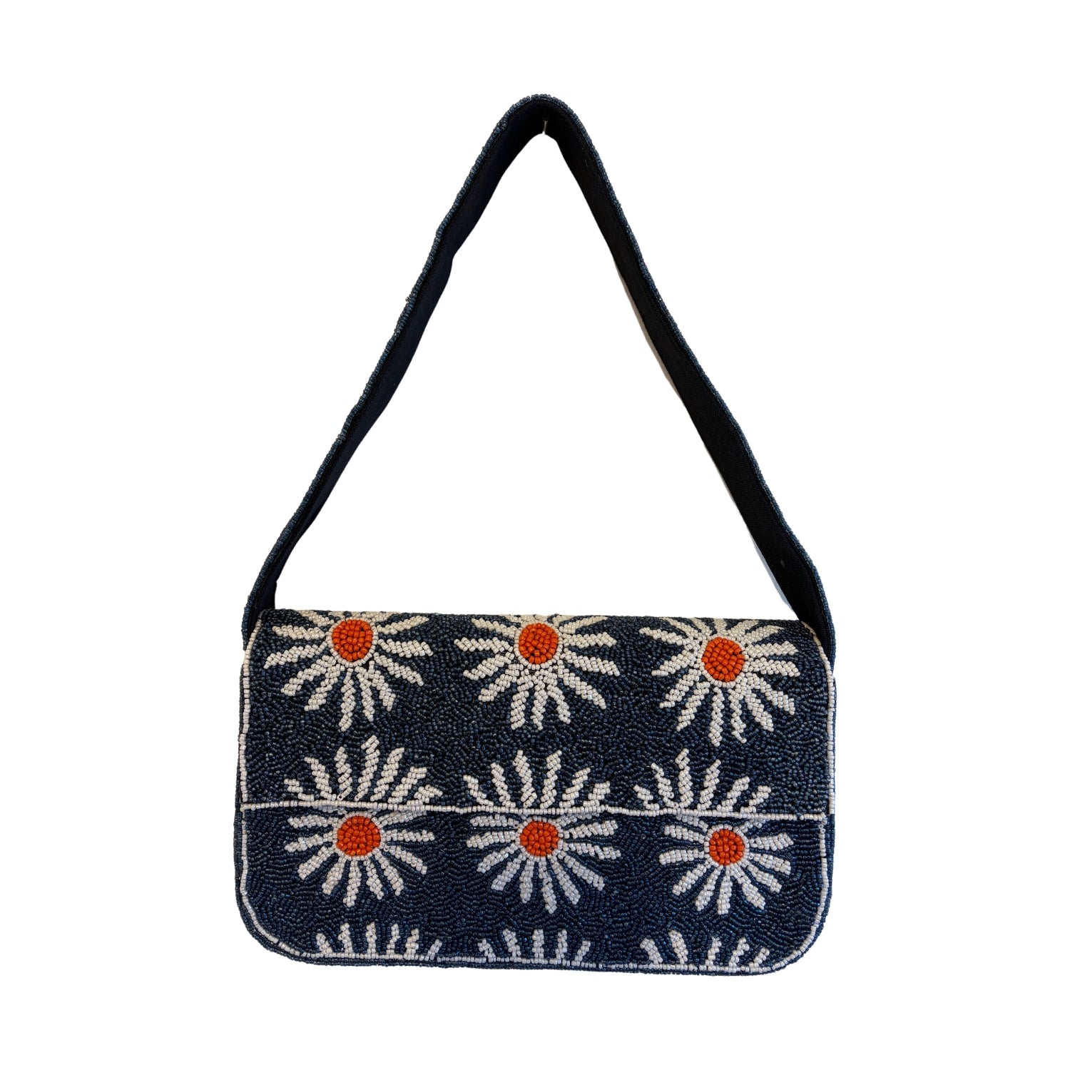 Navy blue handbag with white floral patterns and orange centers on a white background