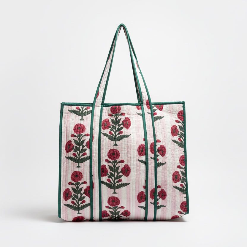 Floral patterned tote bag on a plain background