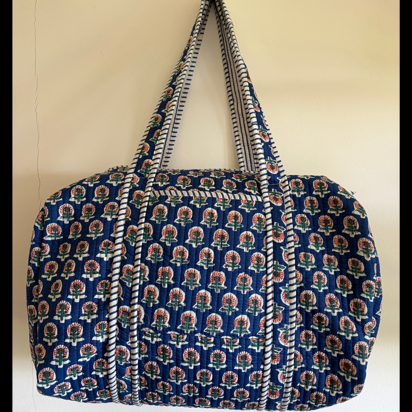 Blue quilted duffle bag UK front view handmade overnight travel bag