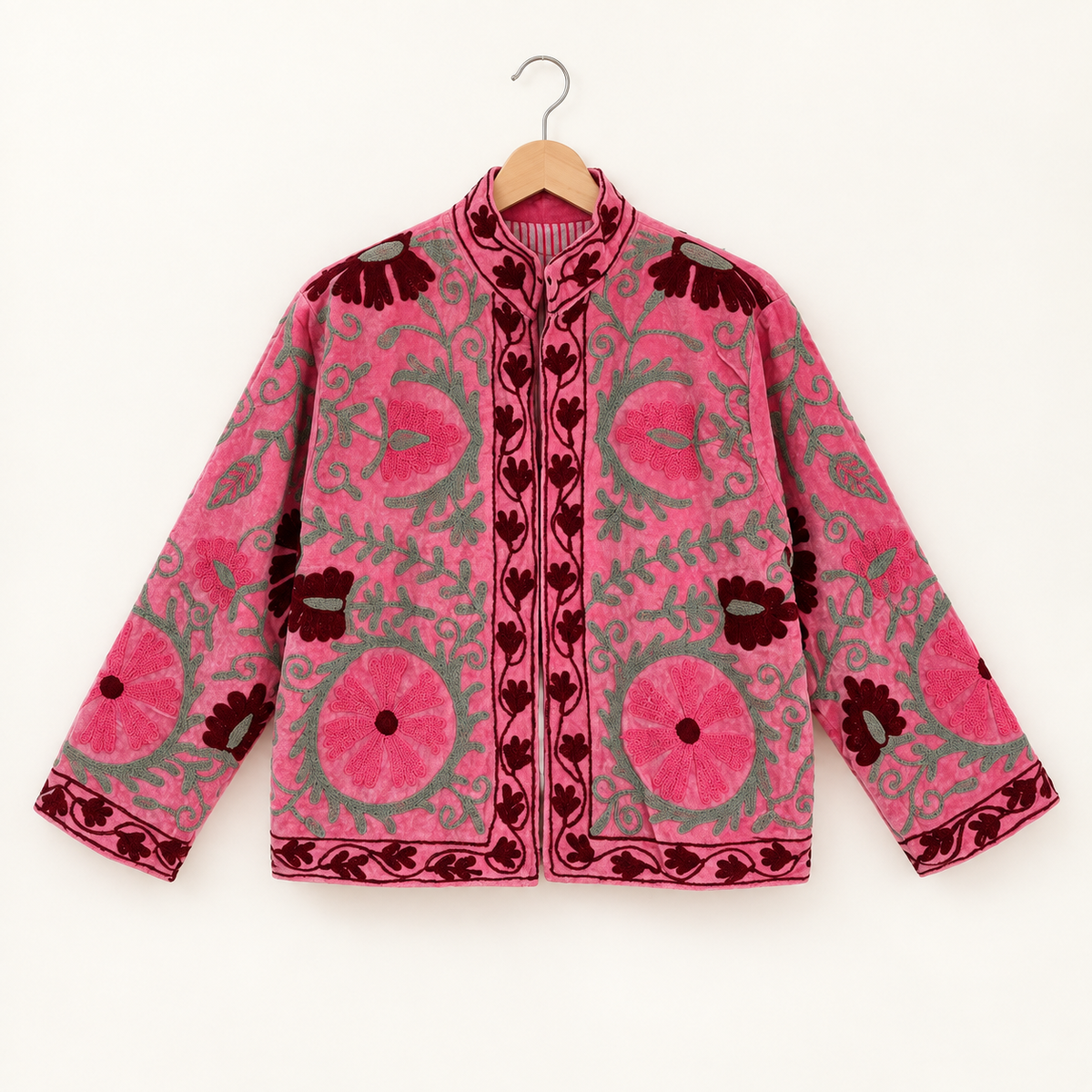 Pink Suzani embroidered Velvet jacket with green and dark red floral patterns. 