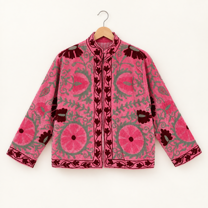 Pink Suzani embroidered Velvet jacket with green and dark red floral patterns. 