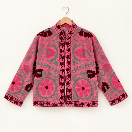 Pink Suzani embroidered Velvet jacket with green and dark red floral patterns. 