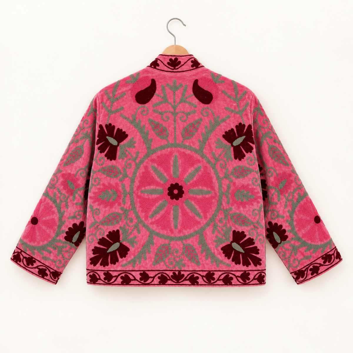 Pink Suzani embroidered Velvet jacket with green and dark red floral patterns. 