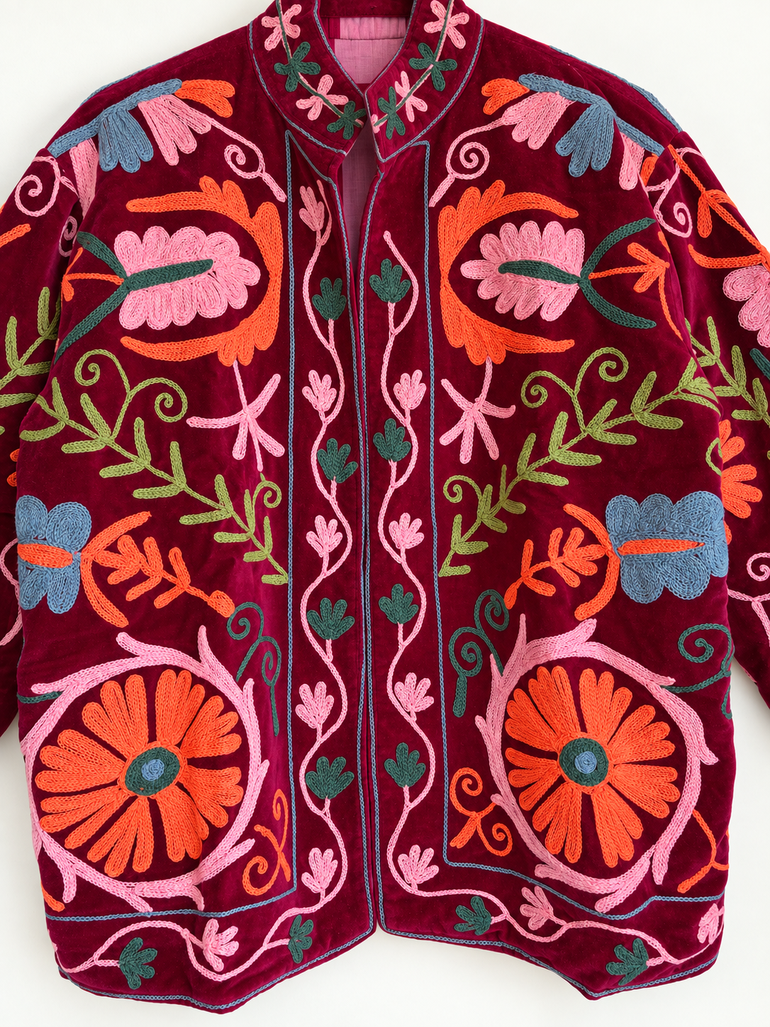 Burgundy velvet with coral and pink floral embroidery on this Suzani jacket