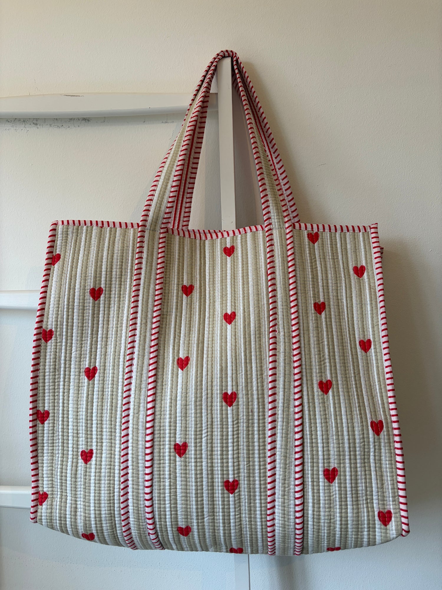 Fabric bag with heart pattern on a white background