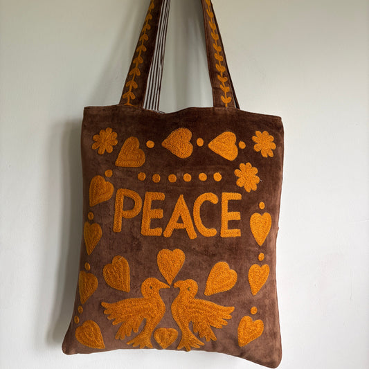 Brown Velvet Tote bag with mustard peace and heart Suzani Embroidery on a white background