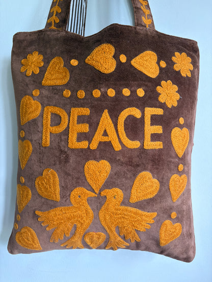 Brown Velvet Tote bag with mustard peace and heart Suzani Embroidery on a white background