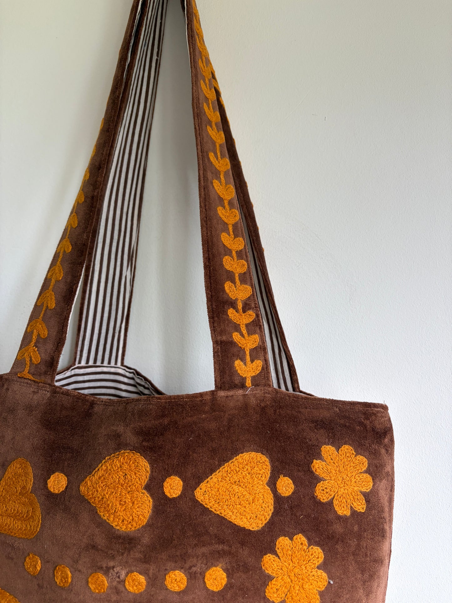 Brown Velvet Tote bag with mustard peace and heart Suzani Embroidery on a white background
