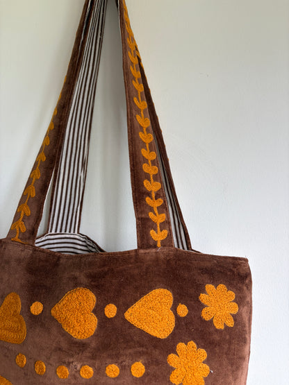 Brown Velvet Tote bag with mustard peace and heart Suzani Embroidery on a white background