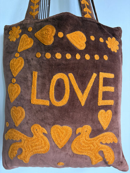 Brown Velvet Tote bag with mustard peace and heart Suzani Embroidery on a white background
