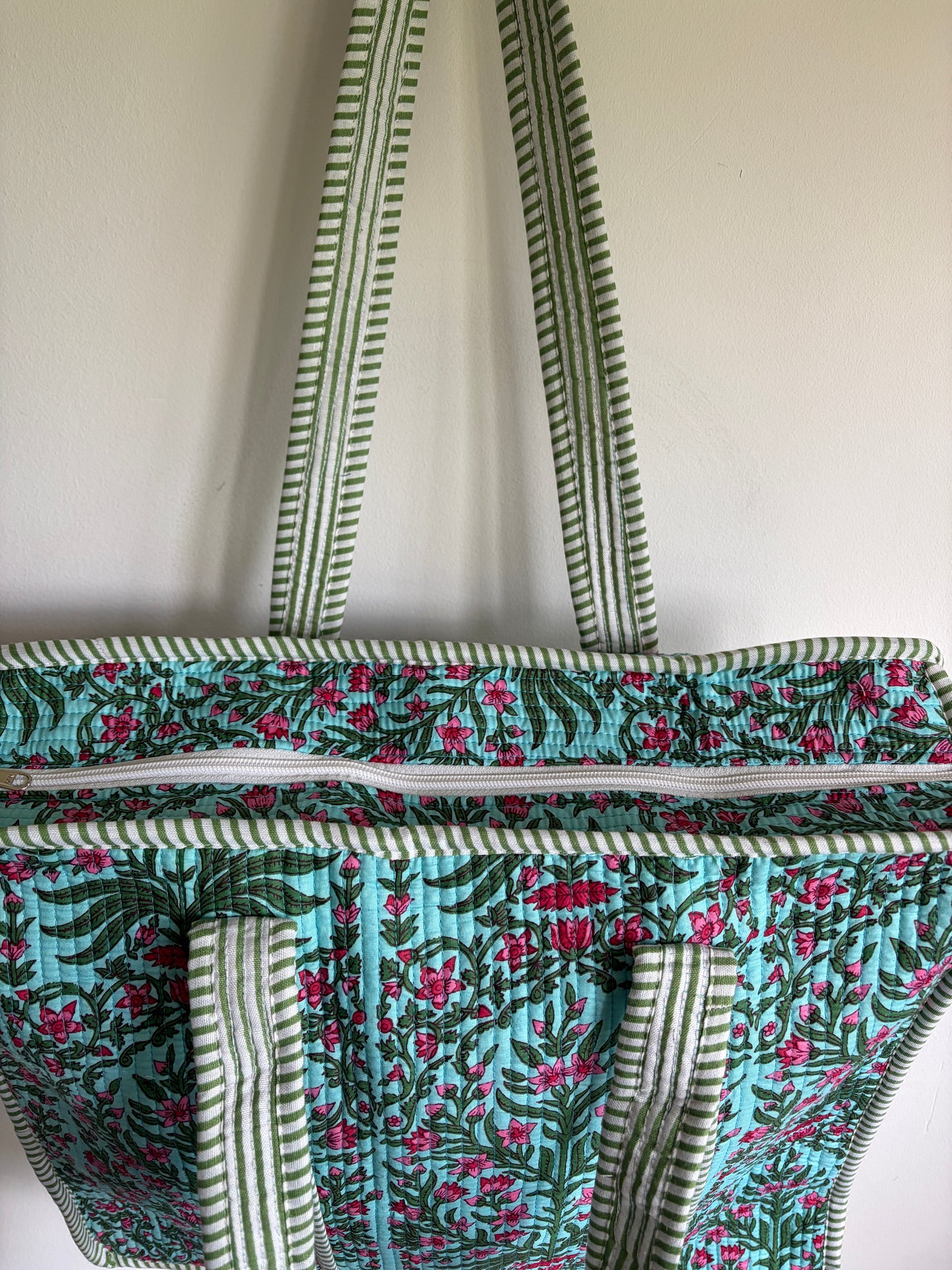 Floral-patterned Tote Bag with a zipper on a white background