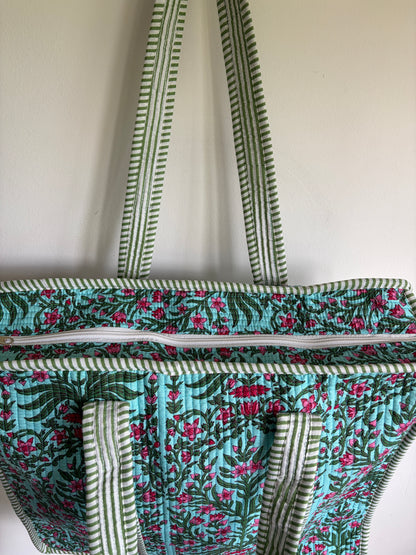 Floral-patterned Tote Bag with a zipper on a white background