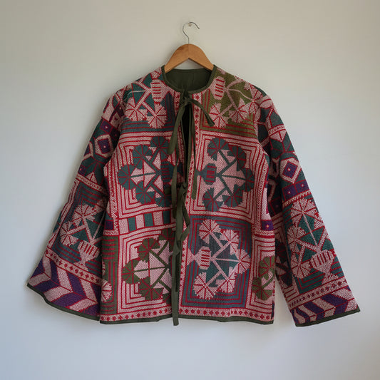 Vintage kantha fabric Jacket on a white background