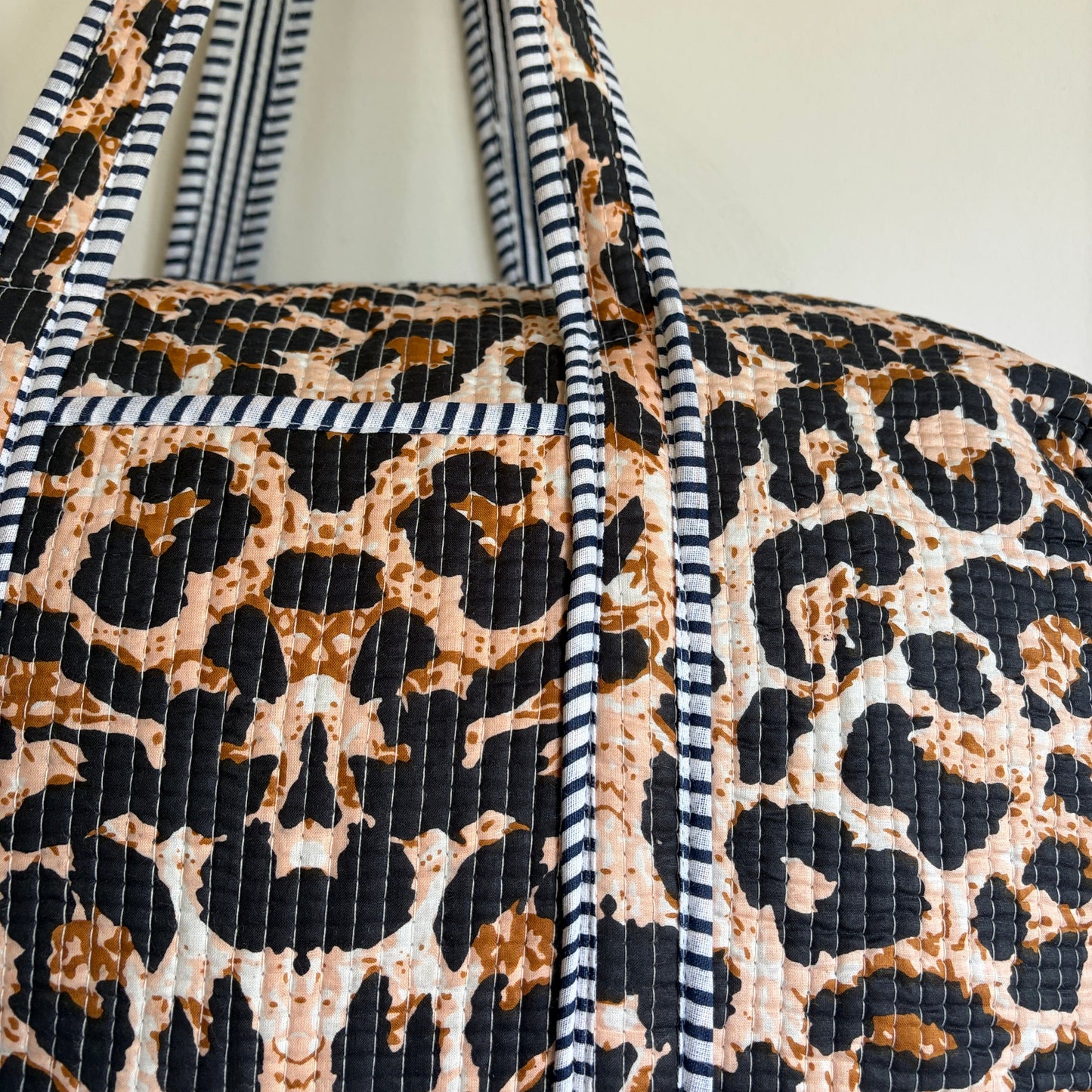Quilted Leopard Print Duffle Bag