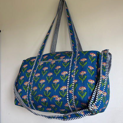 Blue quilted Duffle bag