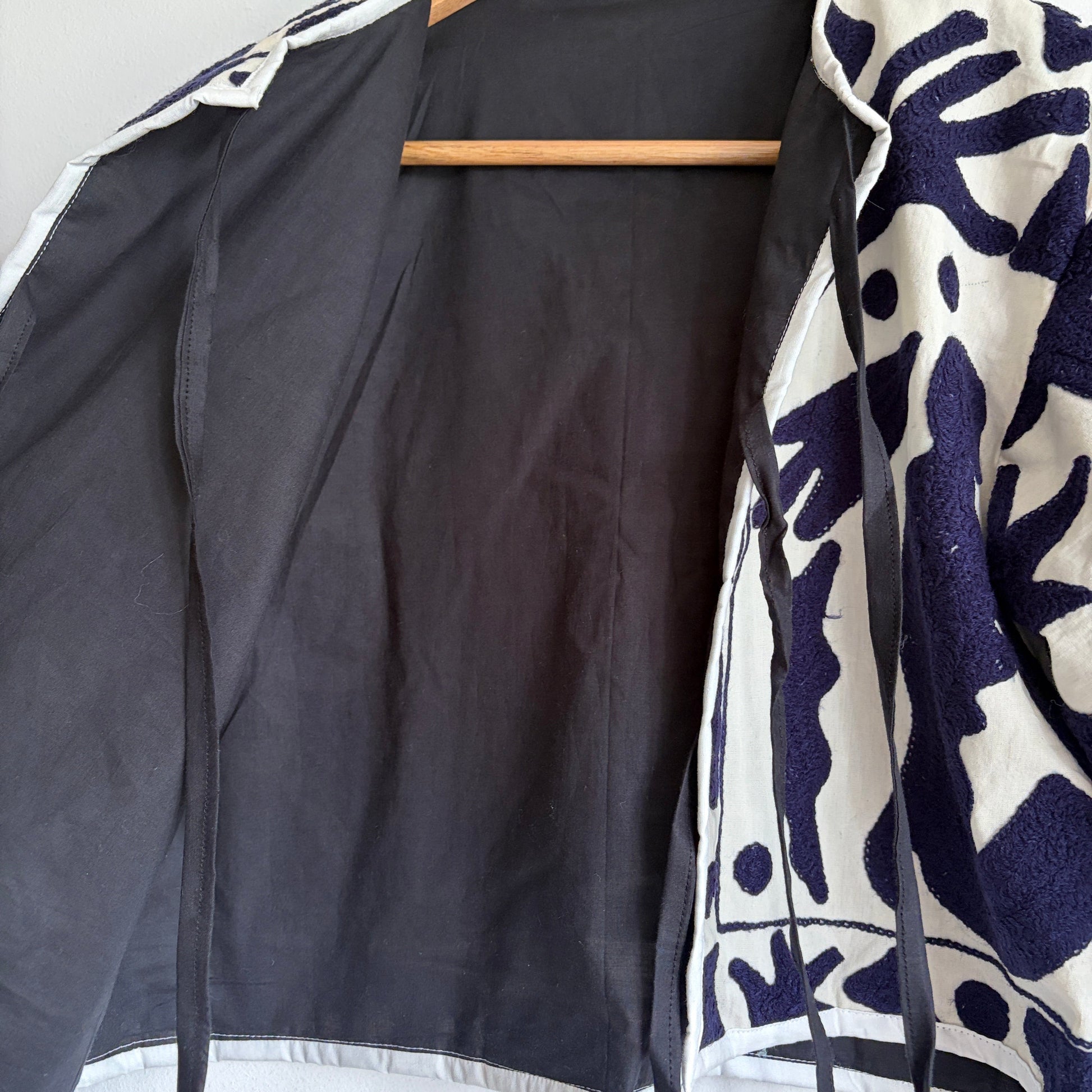 Ivory & Indigo Abstract Embroidered Cropped Jacket