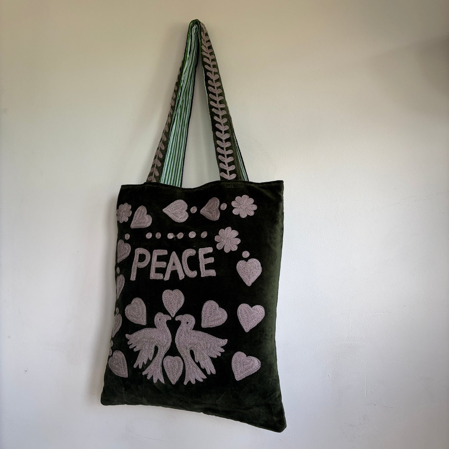 Love embroidery velvet tote bag with a green and white patterned shoulder strap
