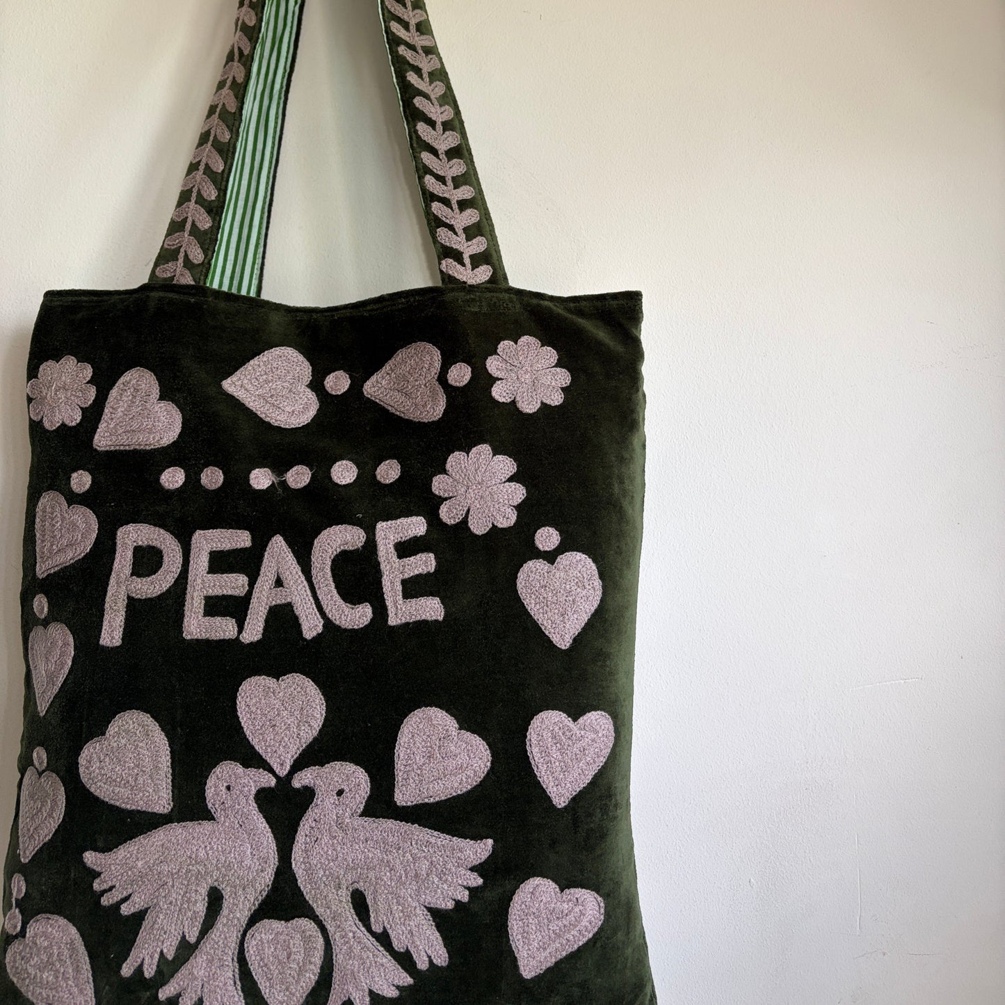 Love embroidery velvet tote bag with a green and white patterned shoulder strap