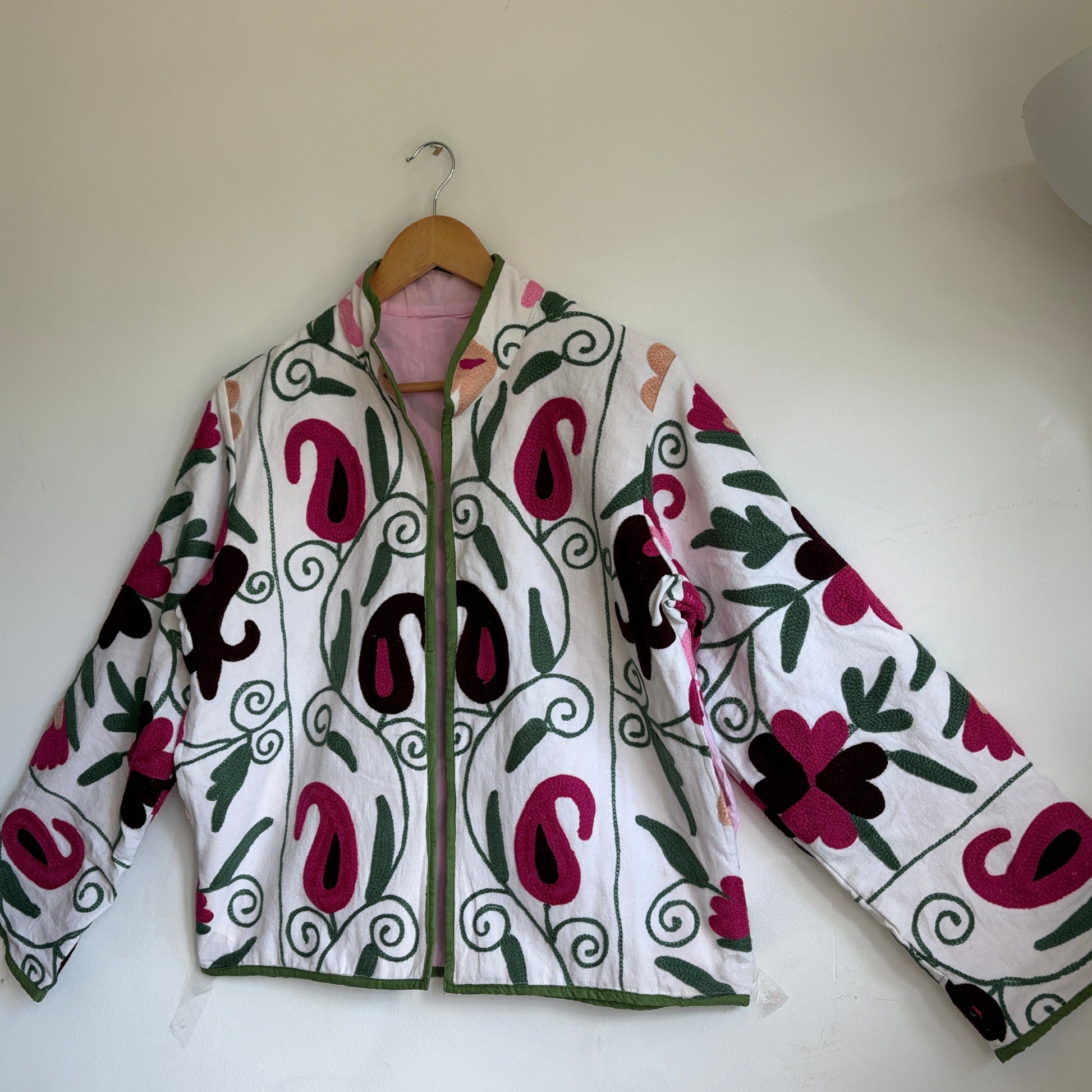 White base colorful Suzani embroidery floral jacket.
