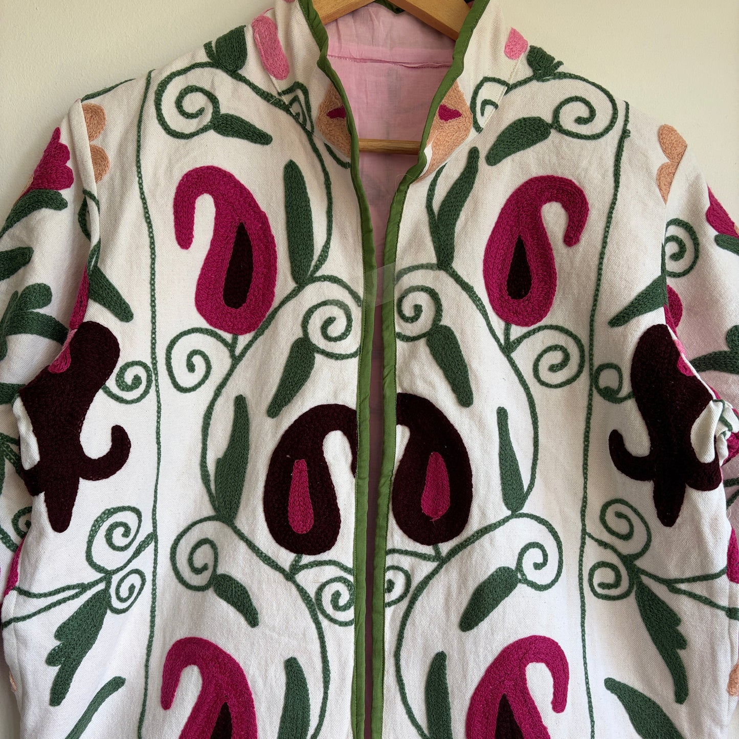 White base colorful Suzani embroidery floral jacket.