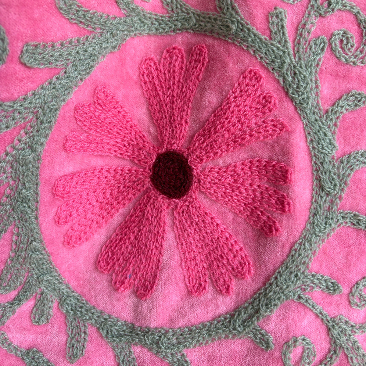 Pink Suzani embroidered Velvet jacket with green and dark red floral patterns. 