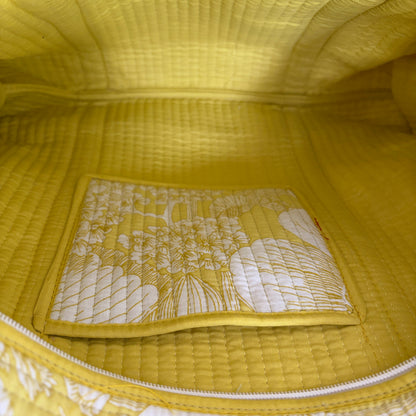 Cotton Quilted tote bag with a yellow and white floral pattern. 