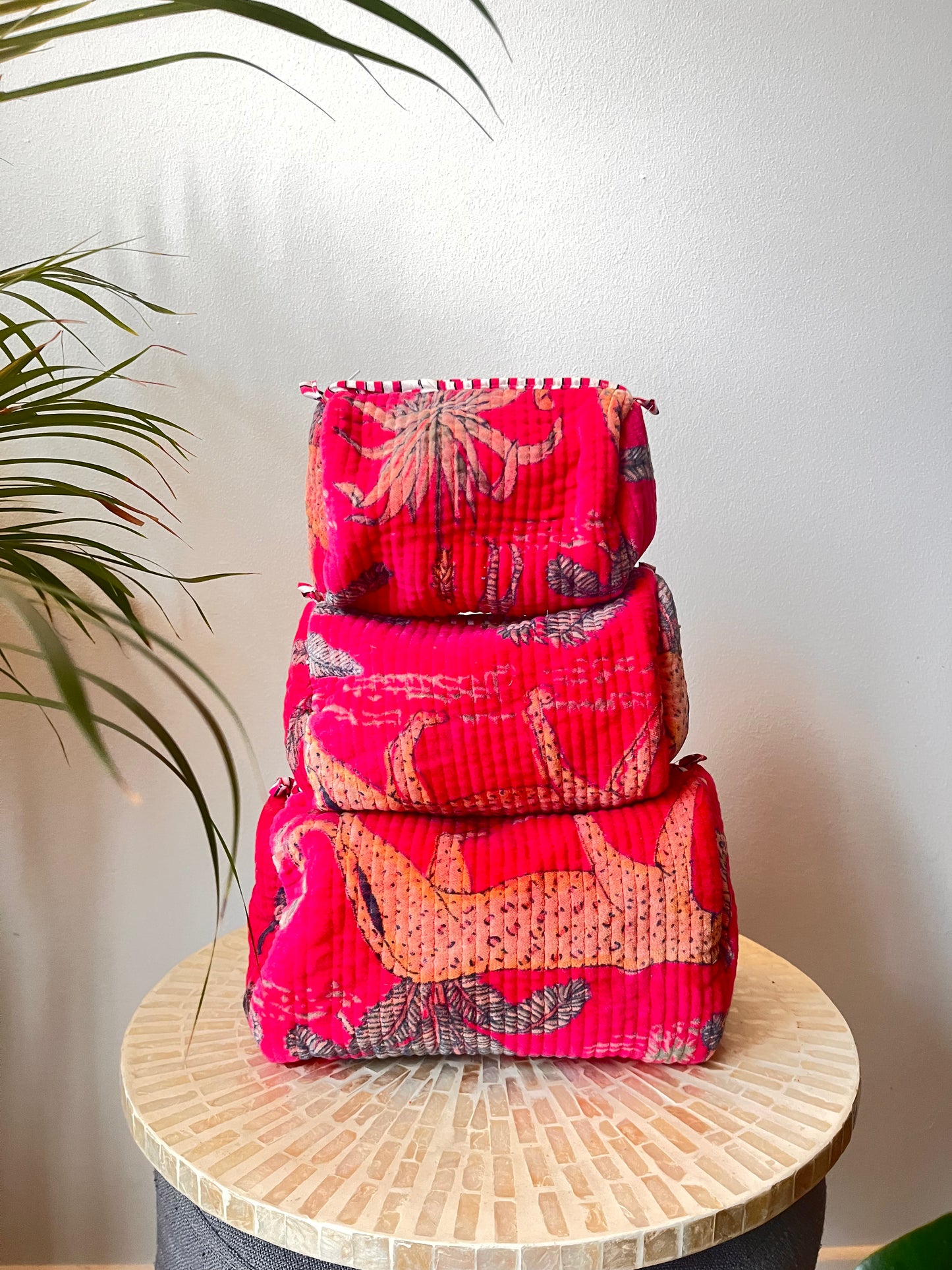 A set of 3 Jungle Print Pink Velvet Quilted Pouches