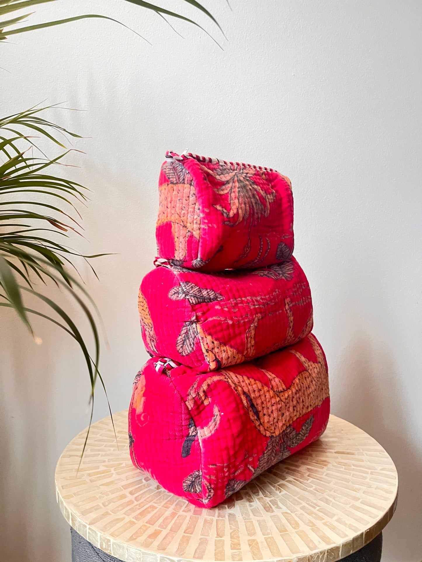 A set of 3 Jungle Print Pink Velvet Quilted Pouches