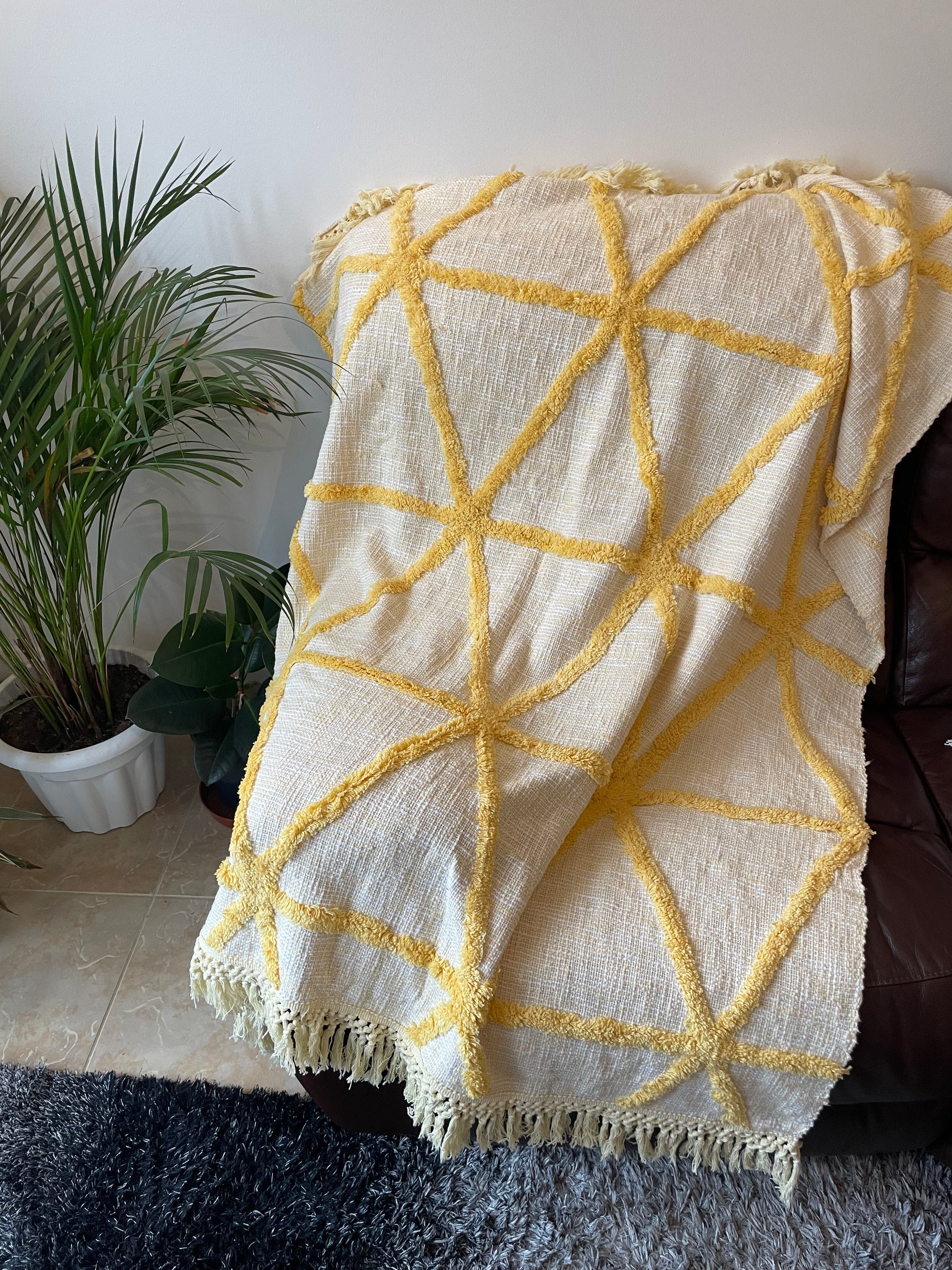 off White Cotton throw with yellow geometric pattern 