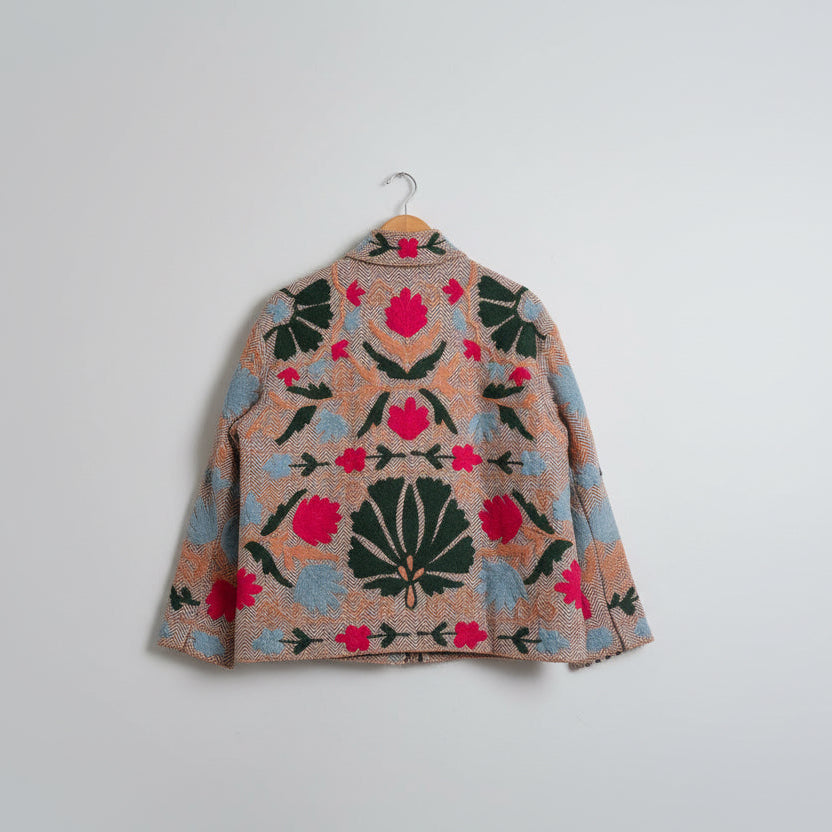 Folded fabric with floral pattern on a white background