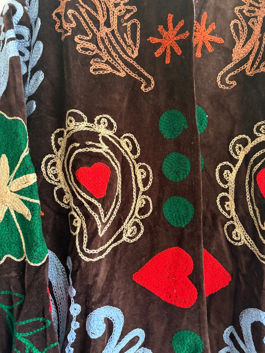 Brown suzani embroidered jacket UK close up embroidery pattern detail