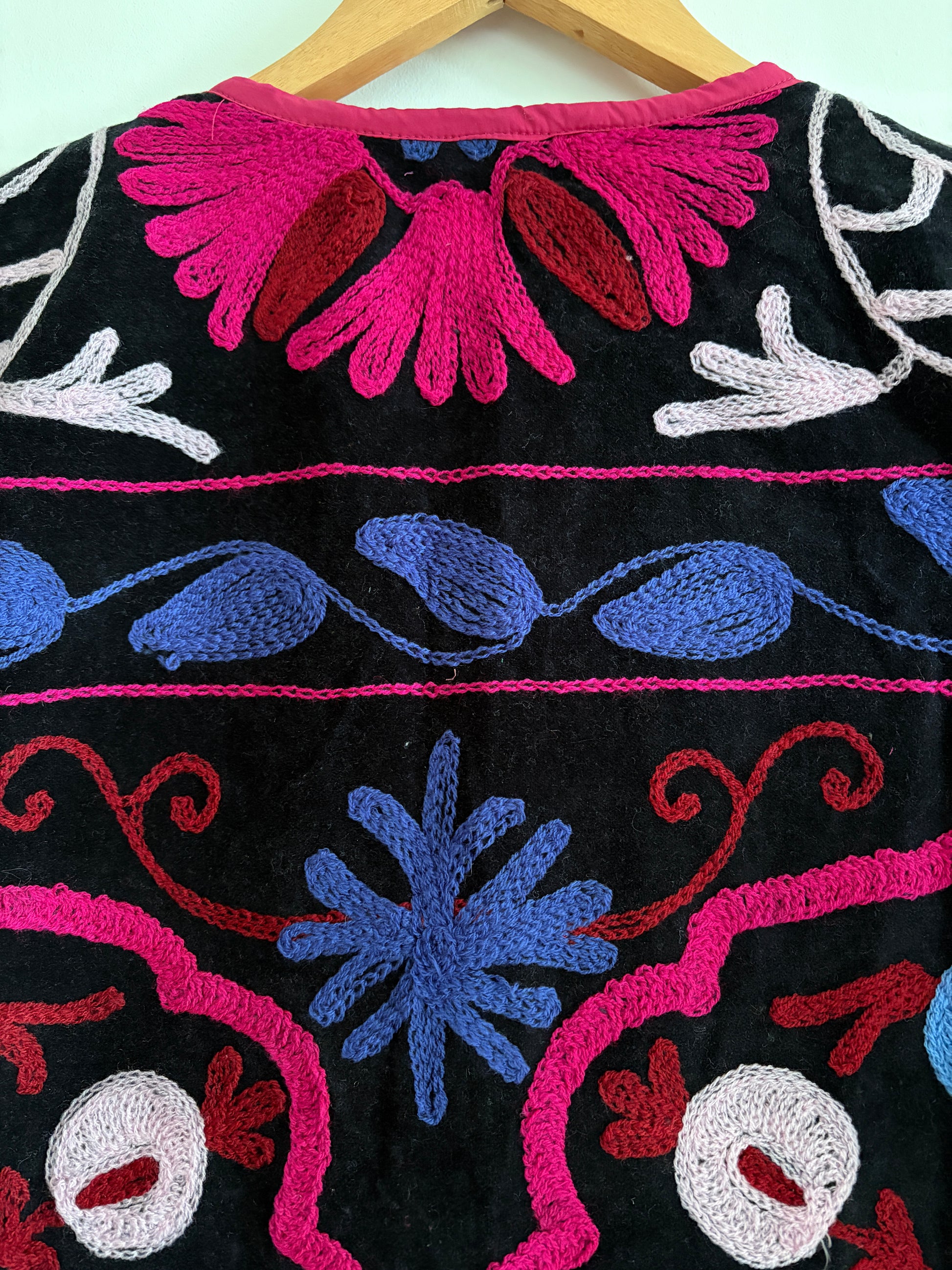 Fuchsia suzani embroidery vest UK intricate pattern detail handmade velvet