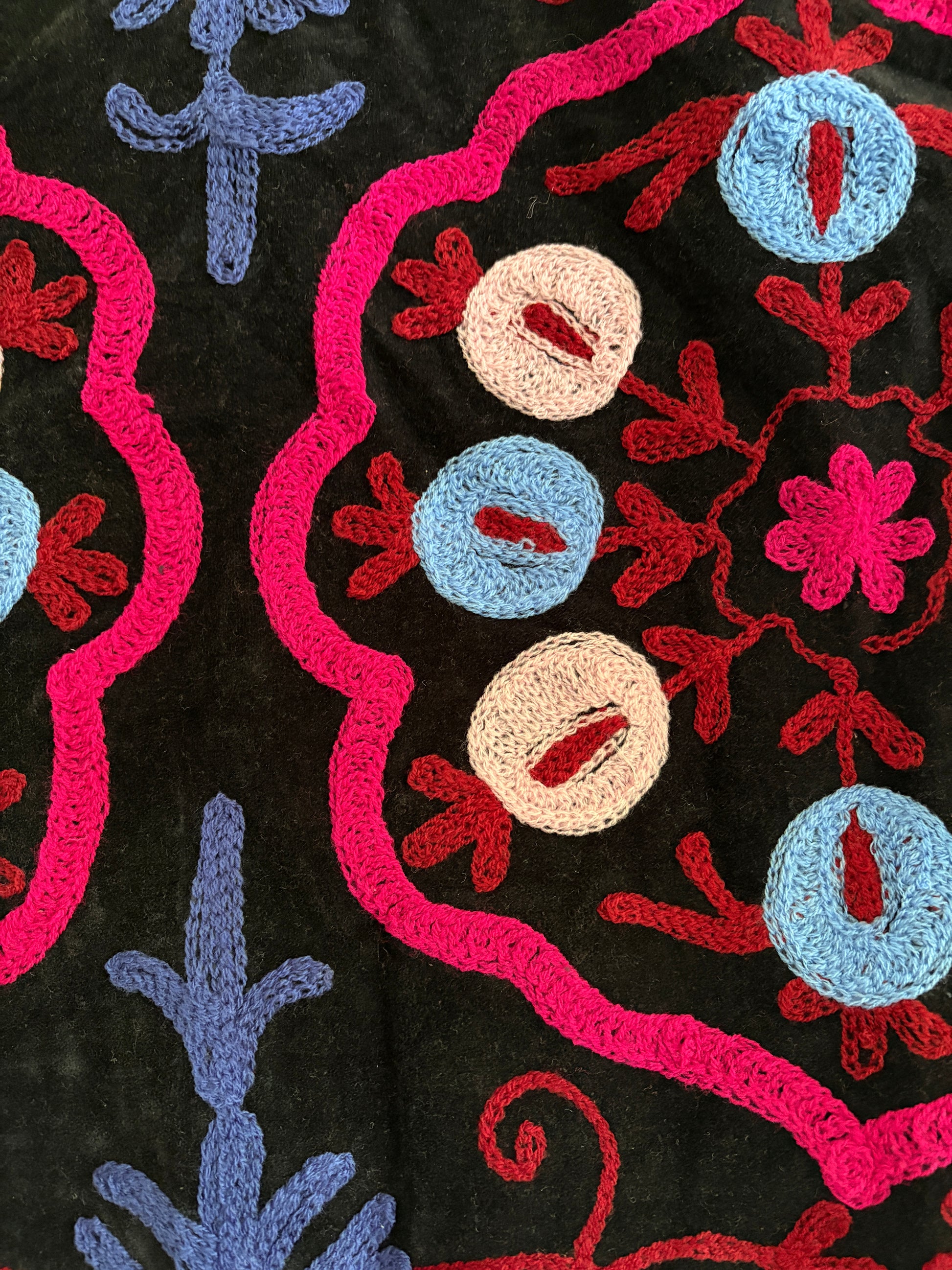Fuchsia suzani embroidery vest UK floral pattern close up velvet embroidery