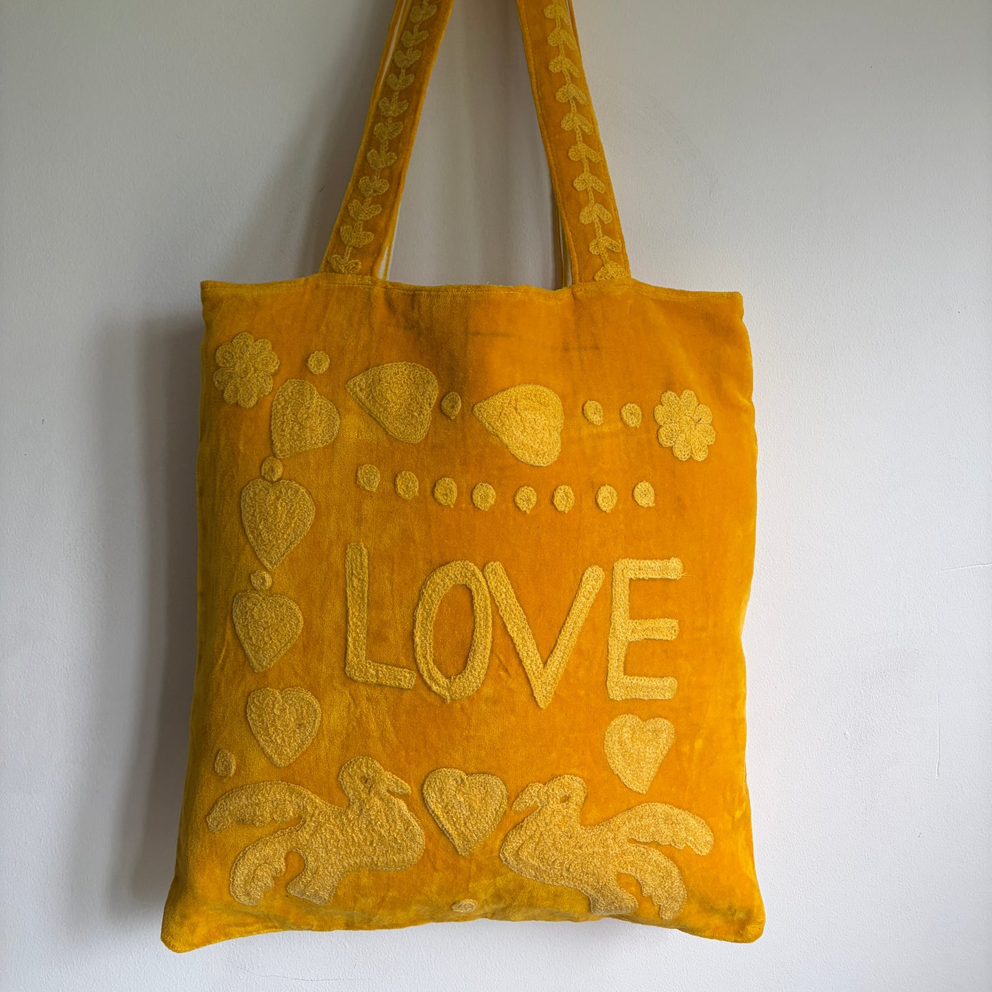 Yellow Velvet Suzani Love Embroidery Tote bag on a white background