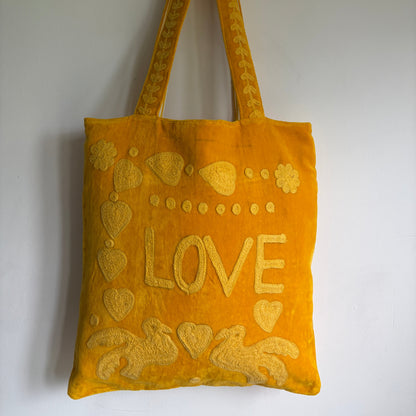 Yellow Velvet Suzani Love Embroidery Tote bag on a white background