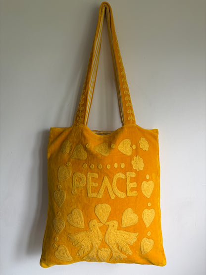 Yellow Velvet Suzani Love Embroidery Tote bag on a white background
