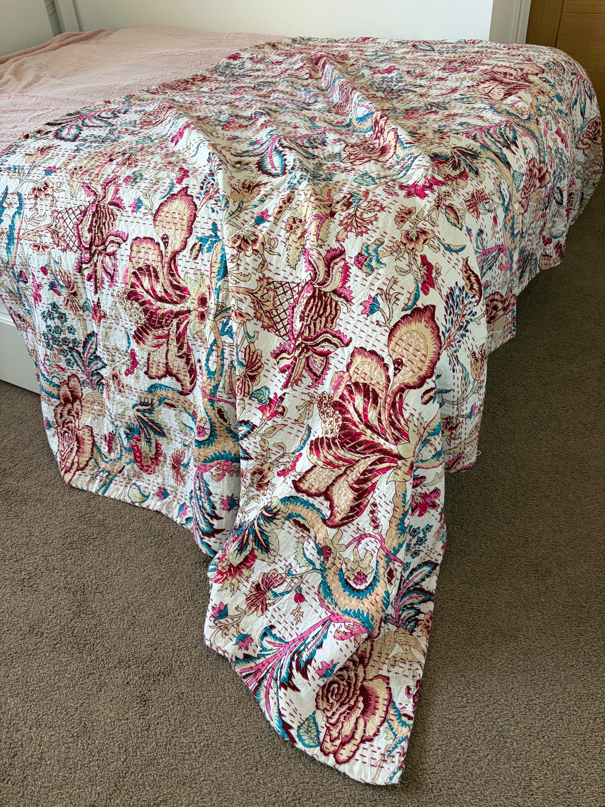 Kantha Bedcover on a bed 