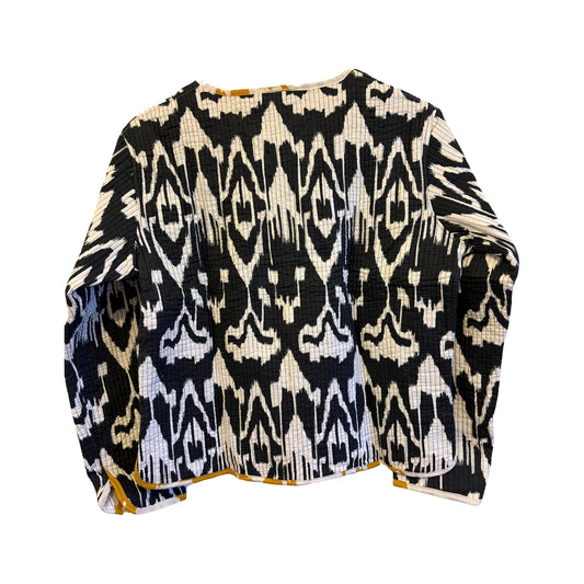 Black and white patterned jacket on a white background