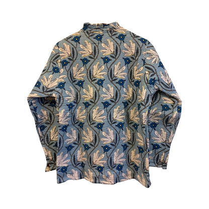 Floral patterned shirt on a white background