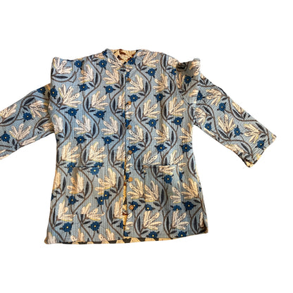 Floral patterned shirt on a white background