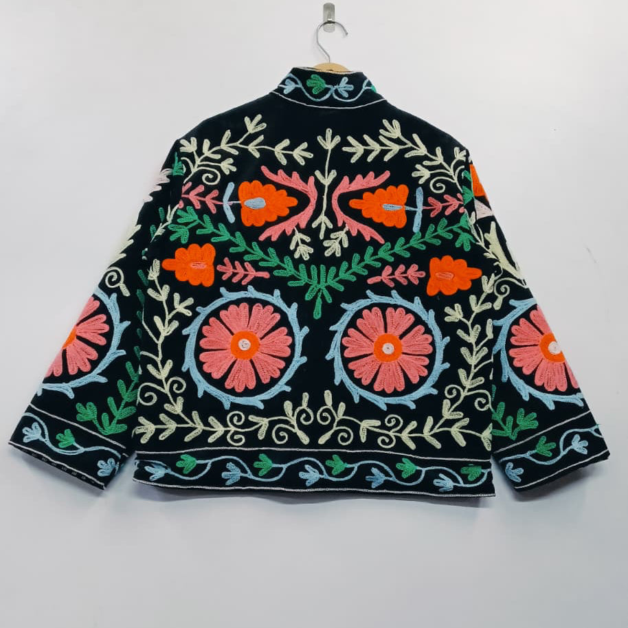 Embroidered jacket with floral patterns on a white background