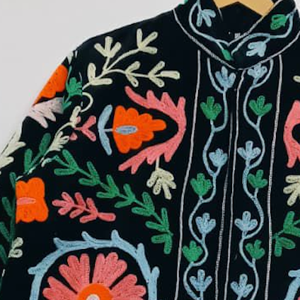 Suzani jacket on a hanger