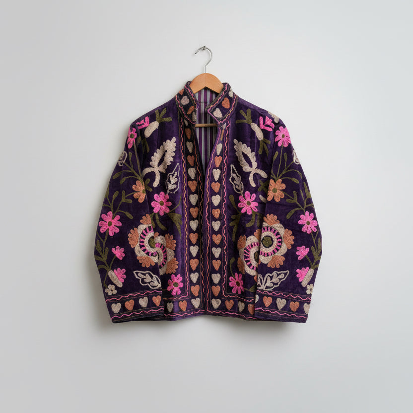 Embroidered purple Jacket with floral and heart patterns on a white background