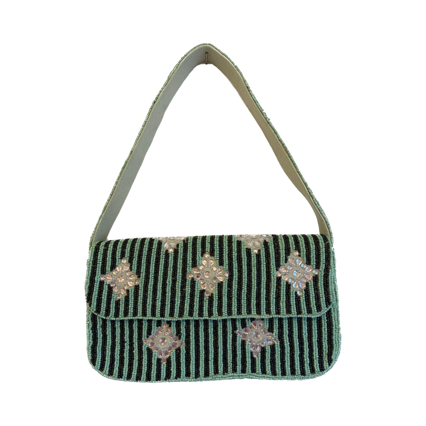 Green handbag with decorative elements on a white background