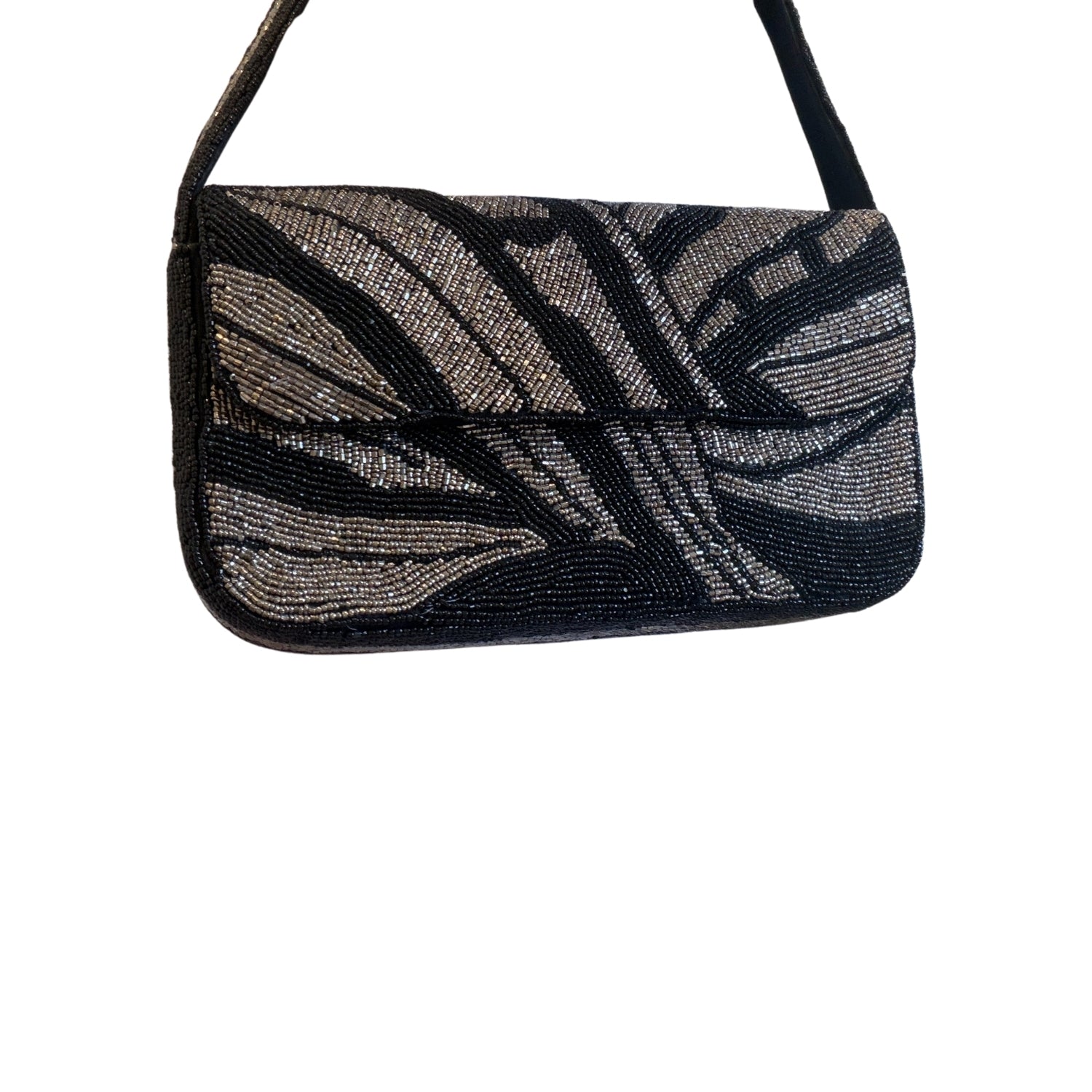 Black beaded handbag with leaf pattern on a white background