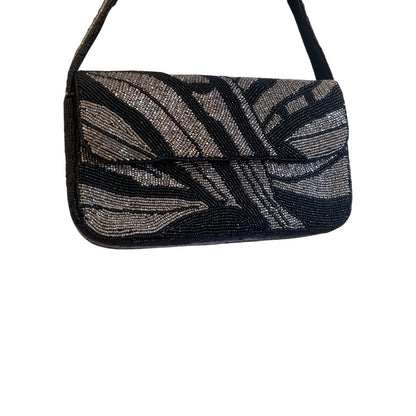 Black beaded handbag with leaf pattern on a white background