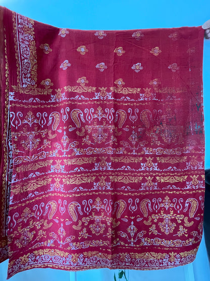 Red fabric with gold and white patterns vintage kantha bed throw